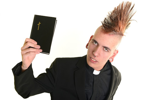 A priest with a bible &#8211; es