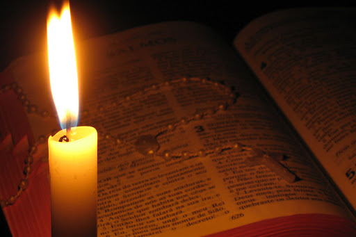 Bible and candle &#8211; es