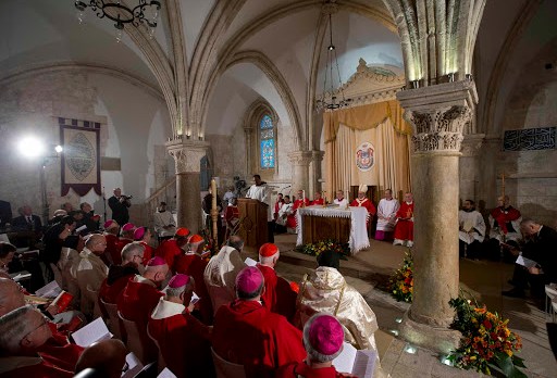 JERUSALEM : Clergymen attend a mass celebrated by Pope Francis (unseen) at the site known as the Cenacle, or Upper Room &#8211; es