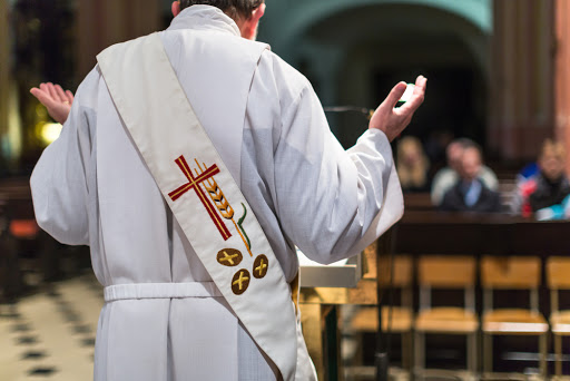 Priest during a Mass &#8211; es