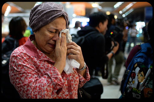WEB Malaysia Ukraine Airline Crash Woman Griefstruck AP Photo Joshua Paul &#8211; es