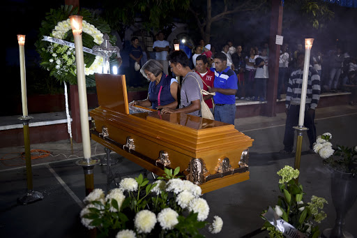 MEXICO, Chilpancingo : The parents and relatives of student Julio Cesar Ramirez Nava &#8211;victim of last weekend clashes&#8211; attend his wake in Ayotzinapa, Chilpancingo, Guerrero state, Mexico &#8211; es
