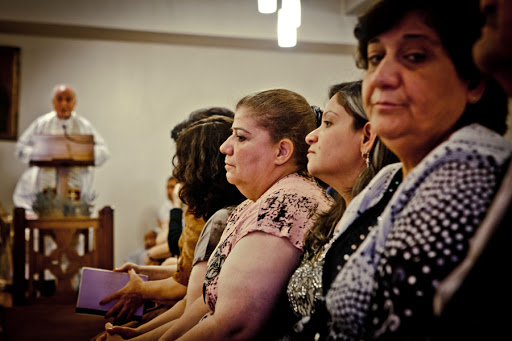 Mass with a Lady who is not looking at the priest &#8211; es