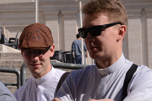 A priest wearing sunglasses &#8211; es