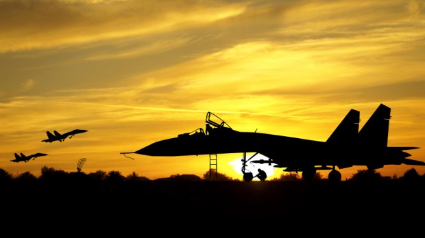 military-aircrafts-silhouettes-on-sunset-background-c2a9-vadimmmus-shutterstock_131717456.jpg