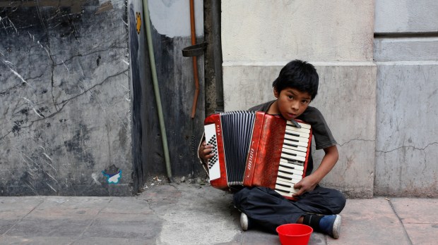 web-mexico-boy-street-music-beggar-geraint-rowland-cc.jpg