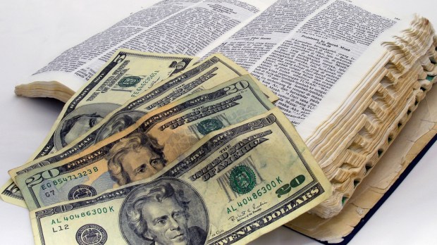 web-wealth-money-bible-dollars-shutterstock_10627741-clux-ai.jpg