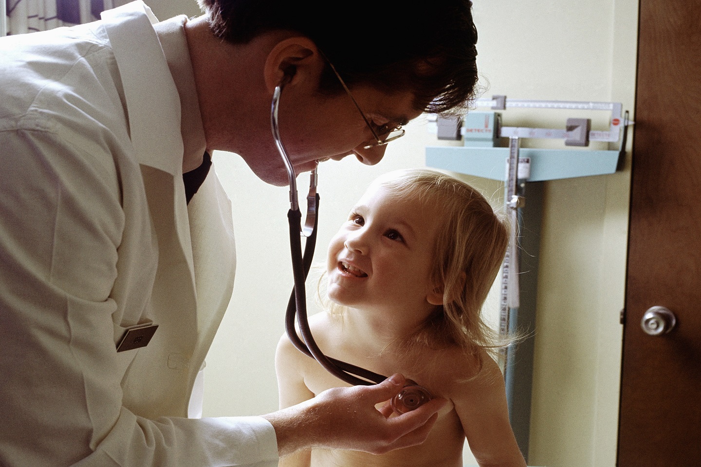 doctor_uses_a_stethoscope_to_examine_a_young_patient.jpeg