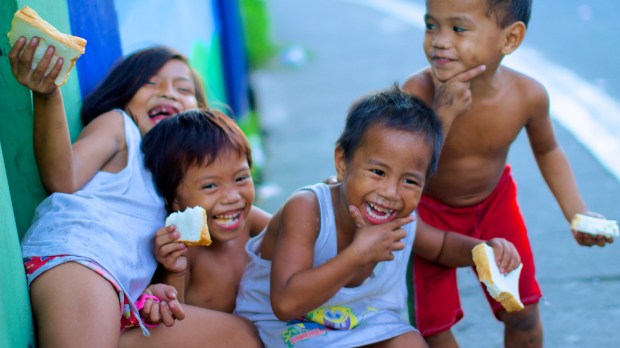 web-poverty-children-food-siblings-smile-2-john-christian-fjellestad-cc.jpg