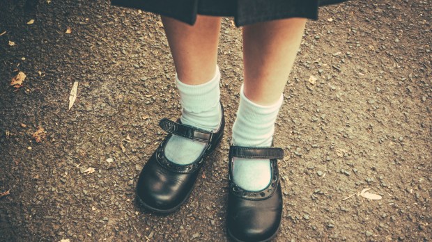 web-school-uniform-girl-legs-shoes-shutterstock_311811626-mr-doomits-ai.jpg