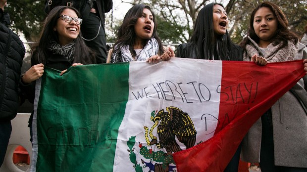 web-immigrants-mexican-flag-karla-ann-cote-cc