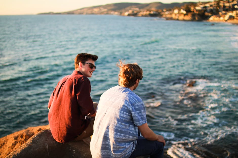 men boys friends talk sea cliff