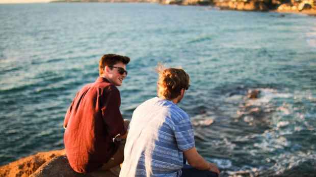 men boys friends talk sea cliff