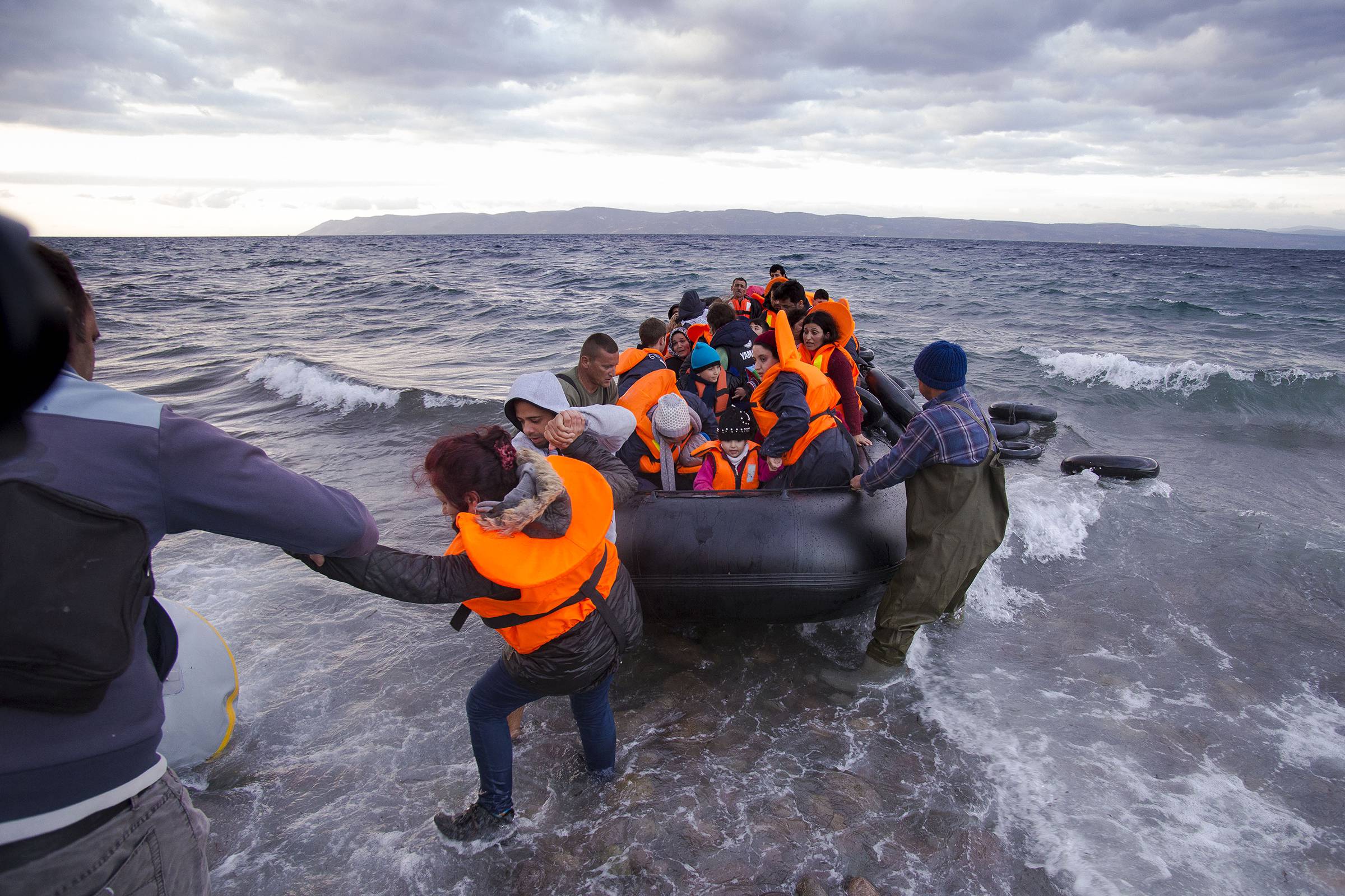 web-christian-refugees-lesbos-greece-syria-nicolas-economou-shutterstock_519491944