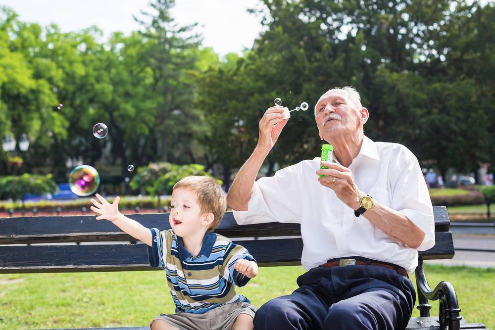 web-grandpa-child-blow-bubbles-dobokristian-shutterstock
