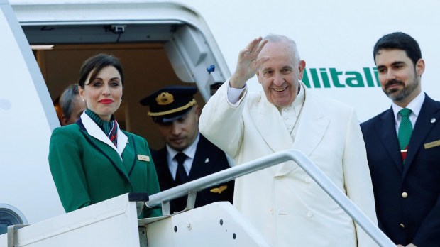Pope Francis boards a plane to Cuba
