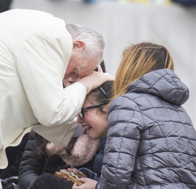 Pope francis blessing a sick girl