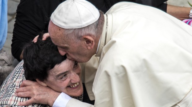 Pope Francis Blessing a sick Man