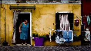 Venice: Woman at her daily routine. As Jesus said in the Speech on the mountain (Mt 5:1-12): “Blessed are the poor in spirit, for theirs is the kingdom of heaven. Blessed are the meek, for they will inherit the earth..." Photo by Hernan Pinera.