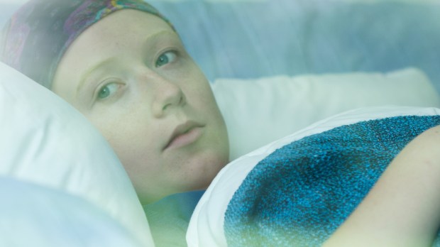 web-woman-cancer-laying-down-photographee-eu-shutterstock_263518448