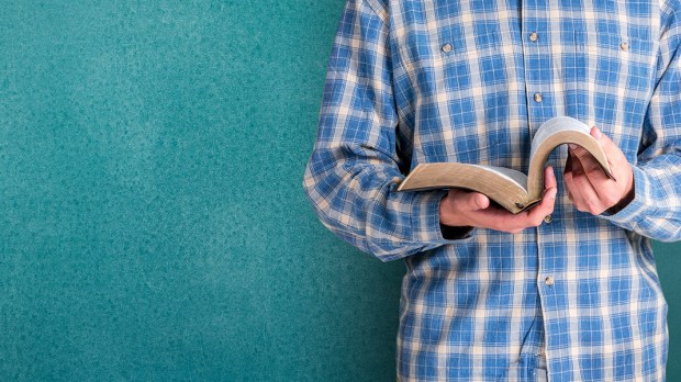 web3-boy-man-reading-bible-billion-photos-shutterstock