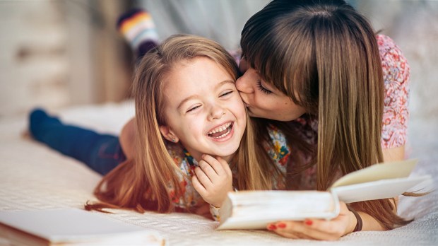 WEB3-DAUGHTER-MOTHER-BOOK-READING-RELAX-LAUGHING-LOVE-KISS-CUTE-Sergiu-Birca-Shutterstock