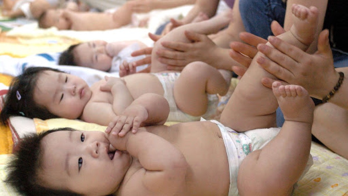 South Korean mothers practice massage to their babies