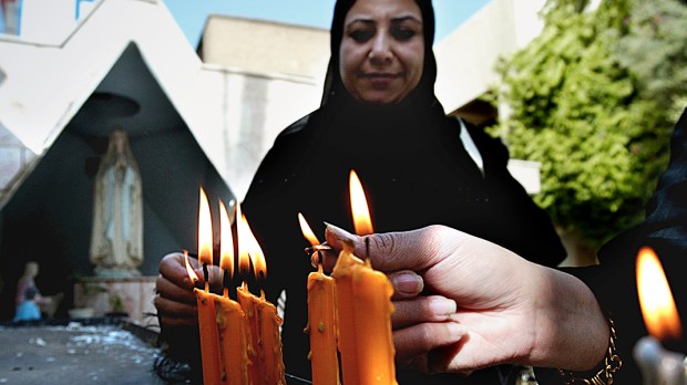 WEB3-BLESSED-MOTHER-MARY-ISLAM-MUSLIM-WOMEN-CANDLES-000_Nic96910-Wisam-Sami-AFP