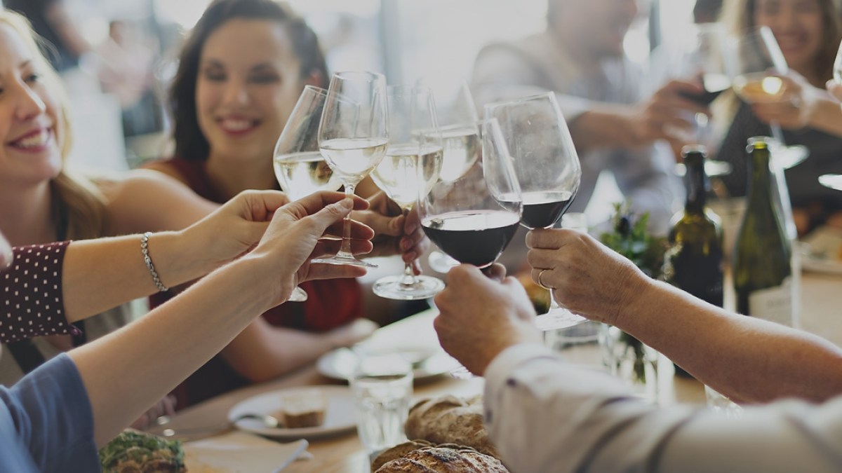WEB3 CELEBRATION DINNER WINE FRIENDS CHEERS Shutterstock