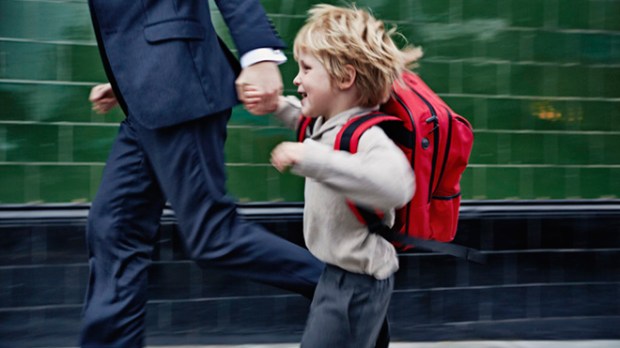WEB3-CHILD-FATHER-RUNNING-SCHOOL-BAG-Frank-Herholdt-Getty-Images