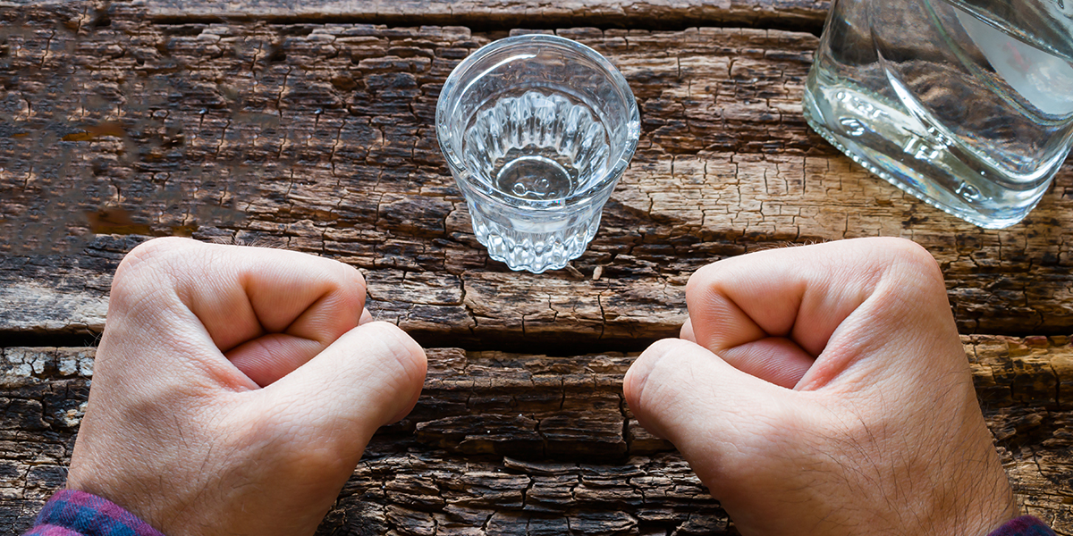 web3-man-hands-alcohol-vodka-itakdalee-shutterstock.jpg