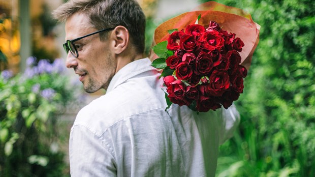 web3-rose-man-flowers-gift-jovo-jovanovic-stocksy-united