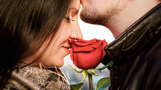 WEB3-WOMAN-MAN-WIFE-HUSBAND-COUPLE-ROSE-FLOWER-LOVE-Shutterstock
