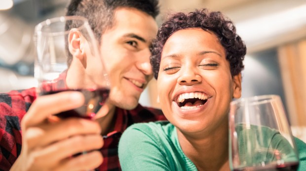 WEB3 COUPLE MARRIED MARRIAGE DATE NIGHT WINE LAUGHING Shutterstock