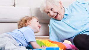 WEB3 GRANDMA BABY GRANDCHILD BABYSITTING GRANDMOTHER HOME FUN PLAY Shutterstock