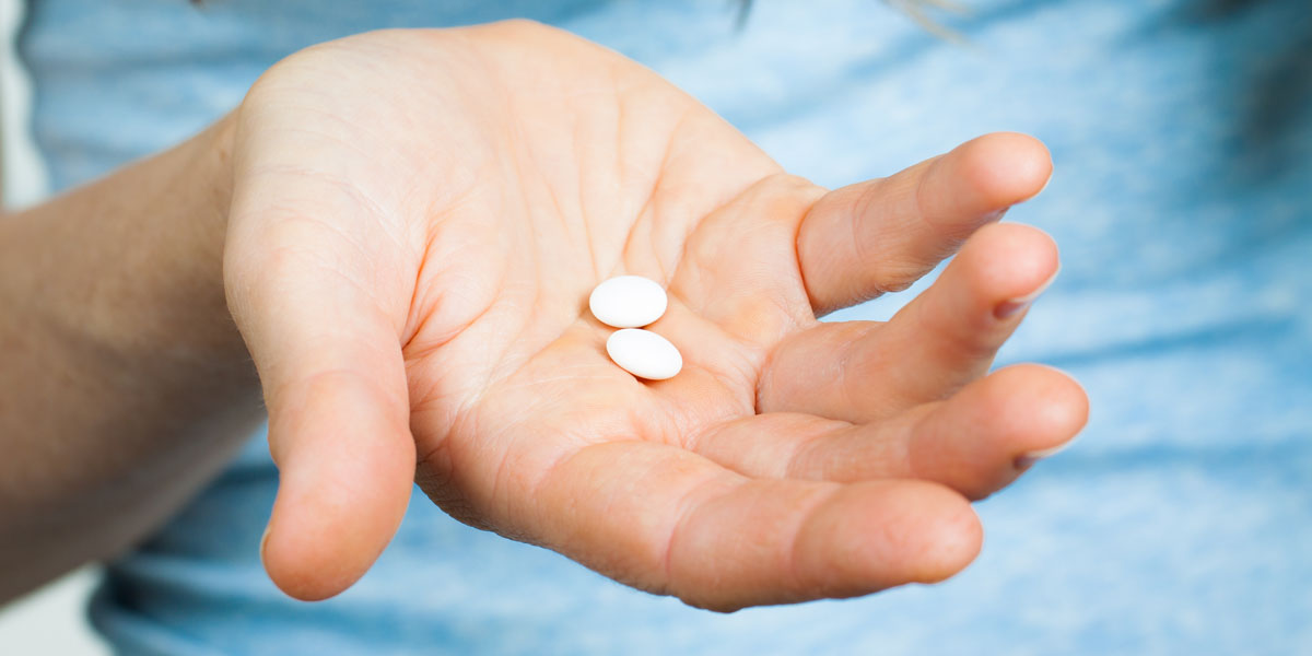 WEB3 HAND PILLS WOMAN ADDICTION OPIOIDS DRUG ADDICTION ADDICT Shutterstock