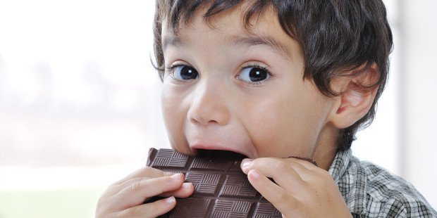 web3-little-boy-eating-chocolate-candy-sweets-shutterstock1