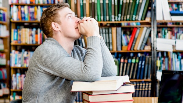 STUDENT PRAYING,LIBRARY