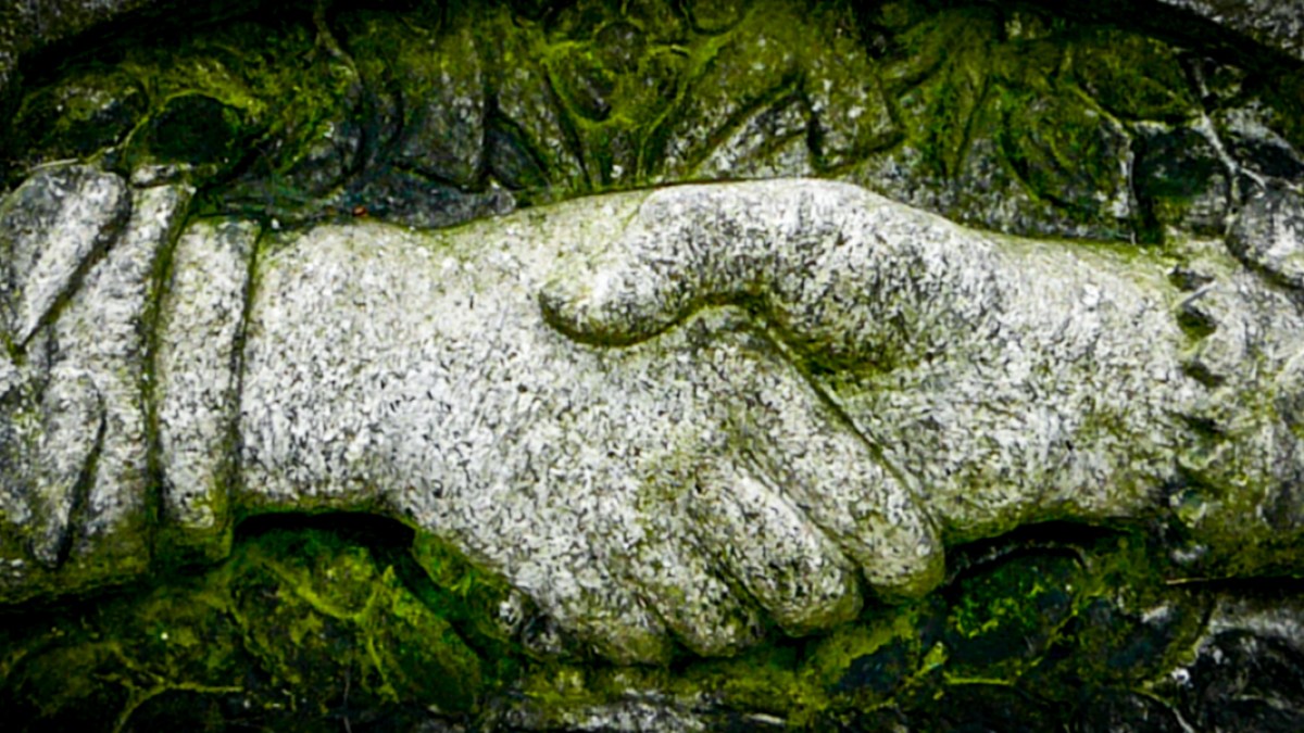 SHAKING HANDS