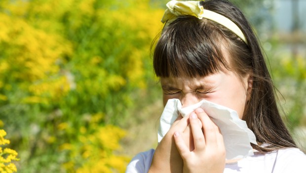 GIRL SNEEZING