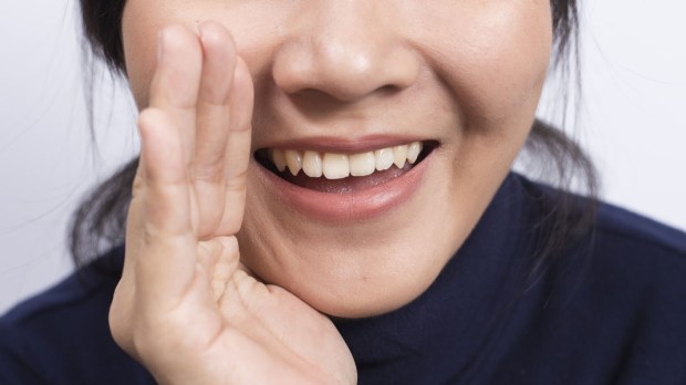 WOMAN,MOUTH,HAND