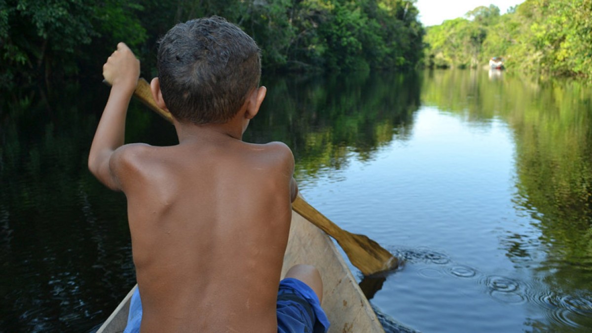BOY IN BOAT