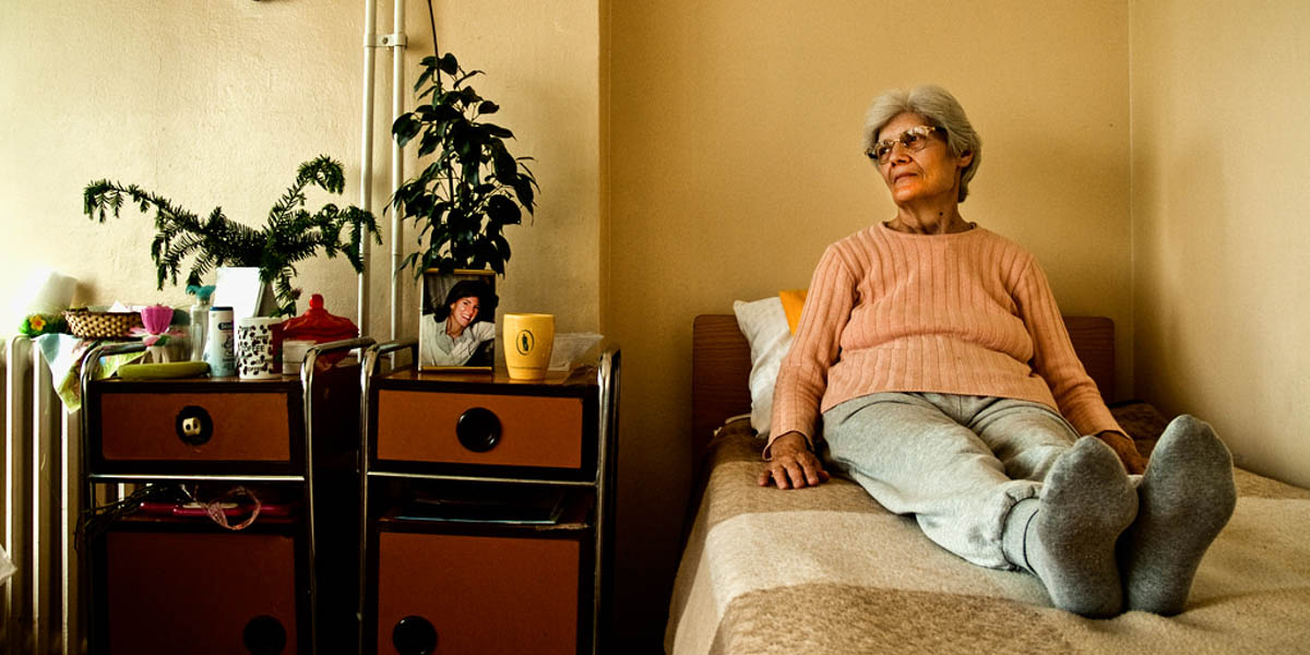 WOMAN ALONE IN BED