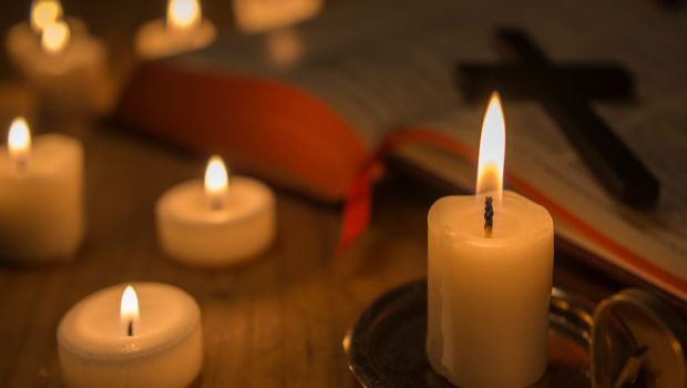 Bible with candles