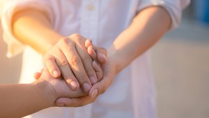 Man and woman holding hands