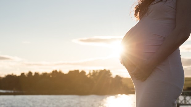 WOMB, PREGNANT, SUNSET