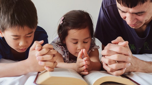 PARENT AND CHILDREN PRAYING