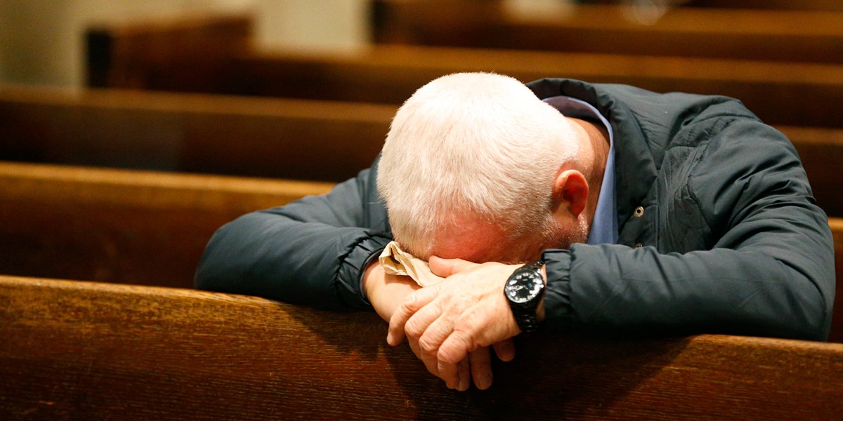 MAN,PRAYS,CHURCH