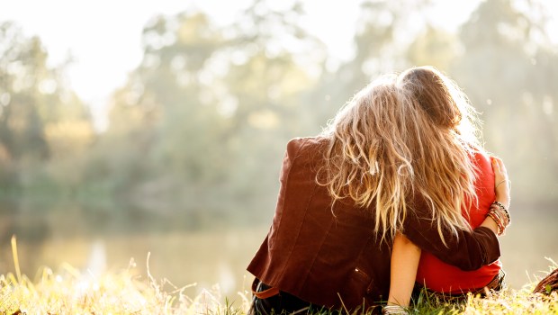 TWO WOMAN HUG
