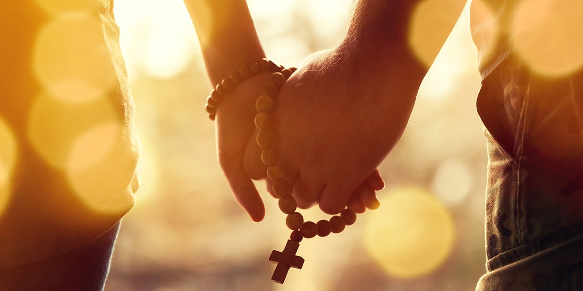 COUPLE PRAYING